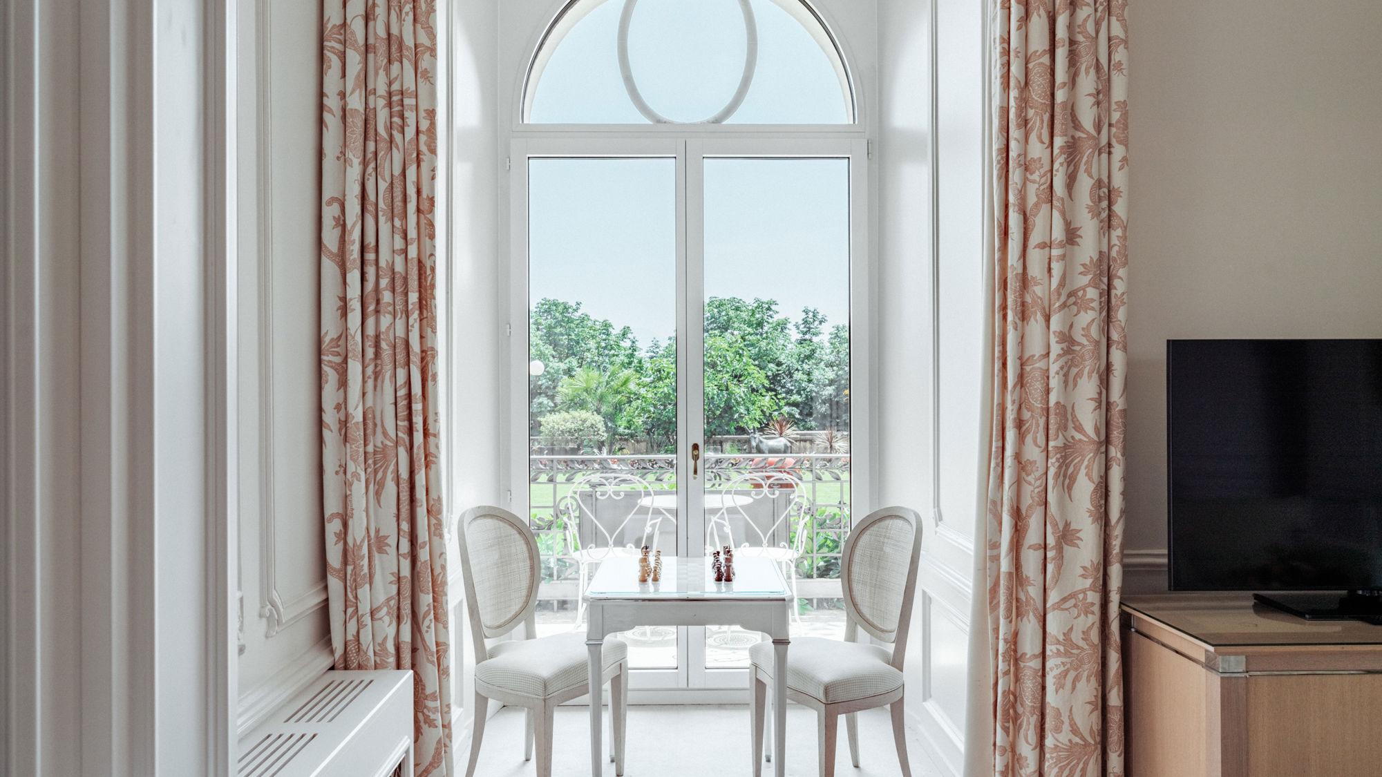 View of the gardens, the lake and the Alps from the Junior Suite Palace Ground Floor Room at Beau-Rivage Palace in Lausanne