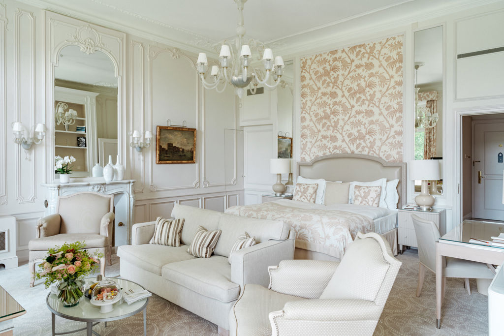 Bedroom and lounge area in the Junior Suite Palace Ground Floor Room at Beau-Rivage Palace in Lausanne