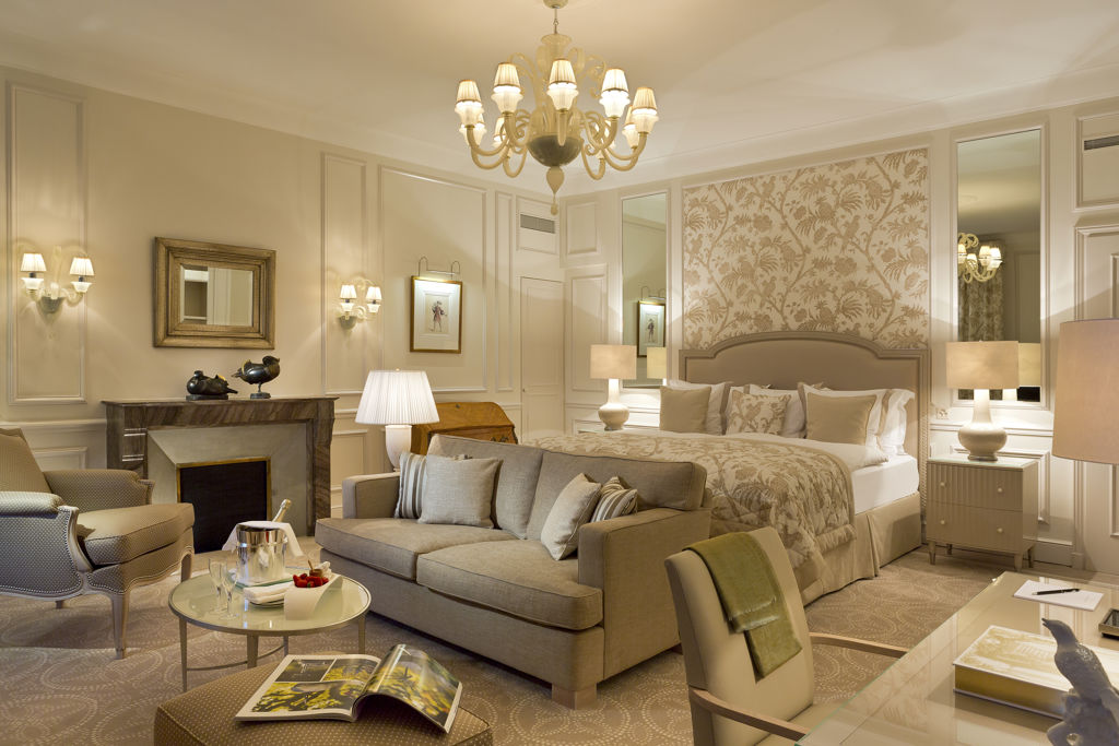 Bedroom and lounge area in the Junior Suite Palace Room at Beau-Rivage Palace in Lausanne