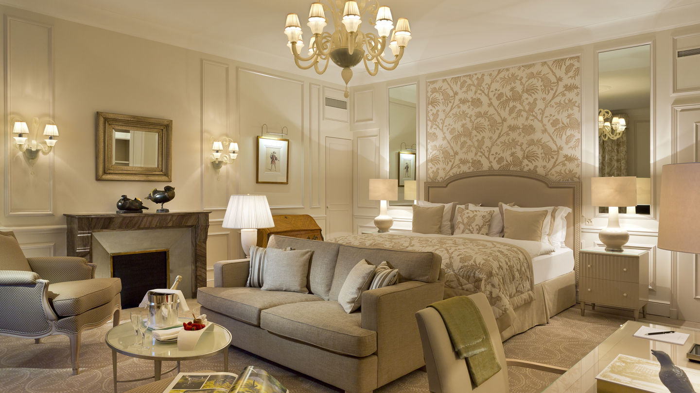 Bedroom and lounge area in the Junior Suite Palace Room at Beau-Rivage Palace in Lausanne