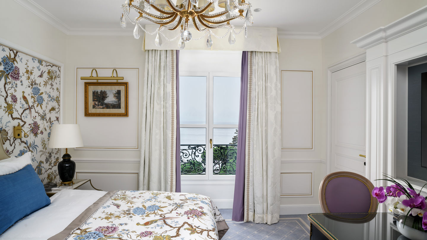 Bedroom of the Malmaison Suite at Beau-Rivage Palace in Lausanne overlooking the lake and the Alps