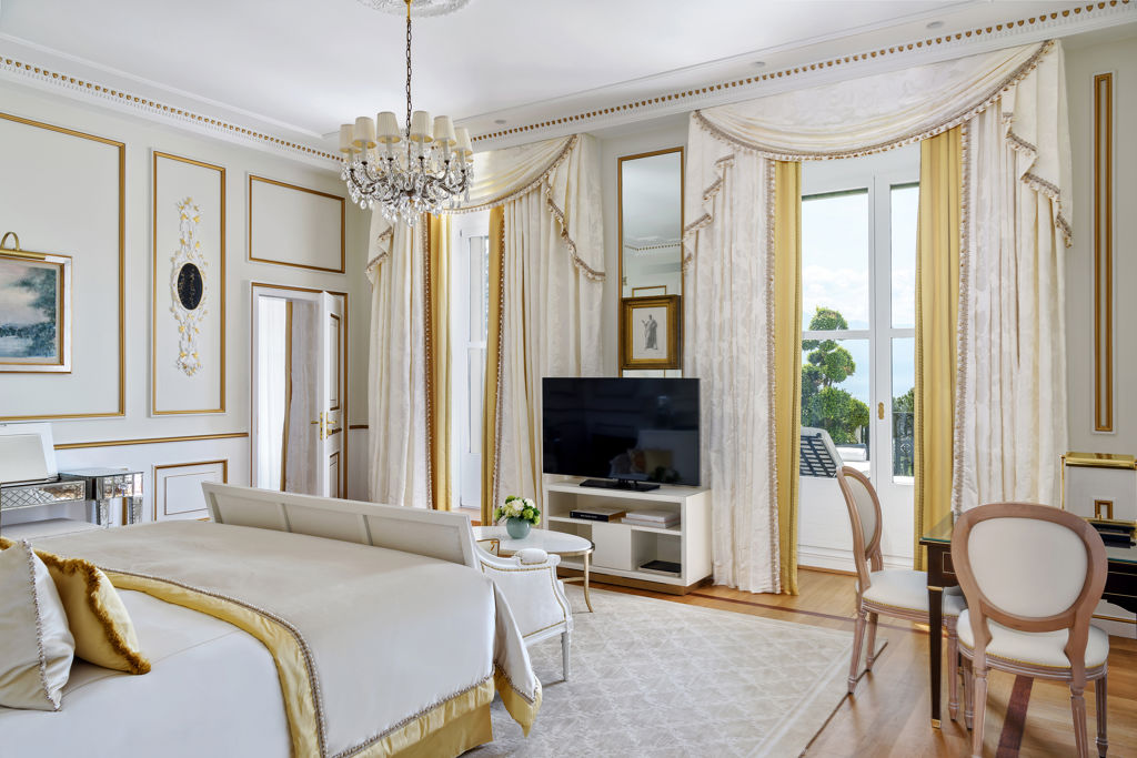 Master bedroom of the Imperial Suite at Beau-Rivage Palace in Lausanne overlooking the lake and the Alps