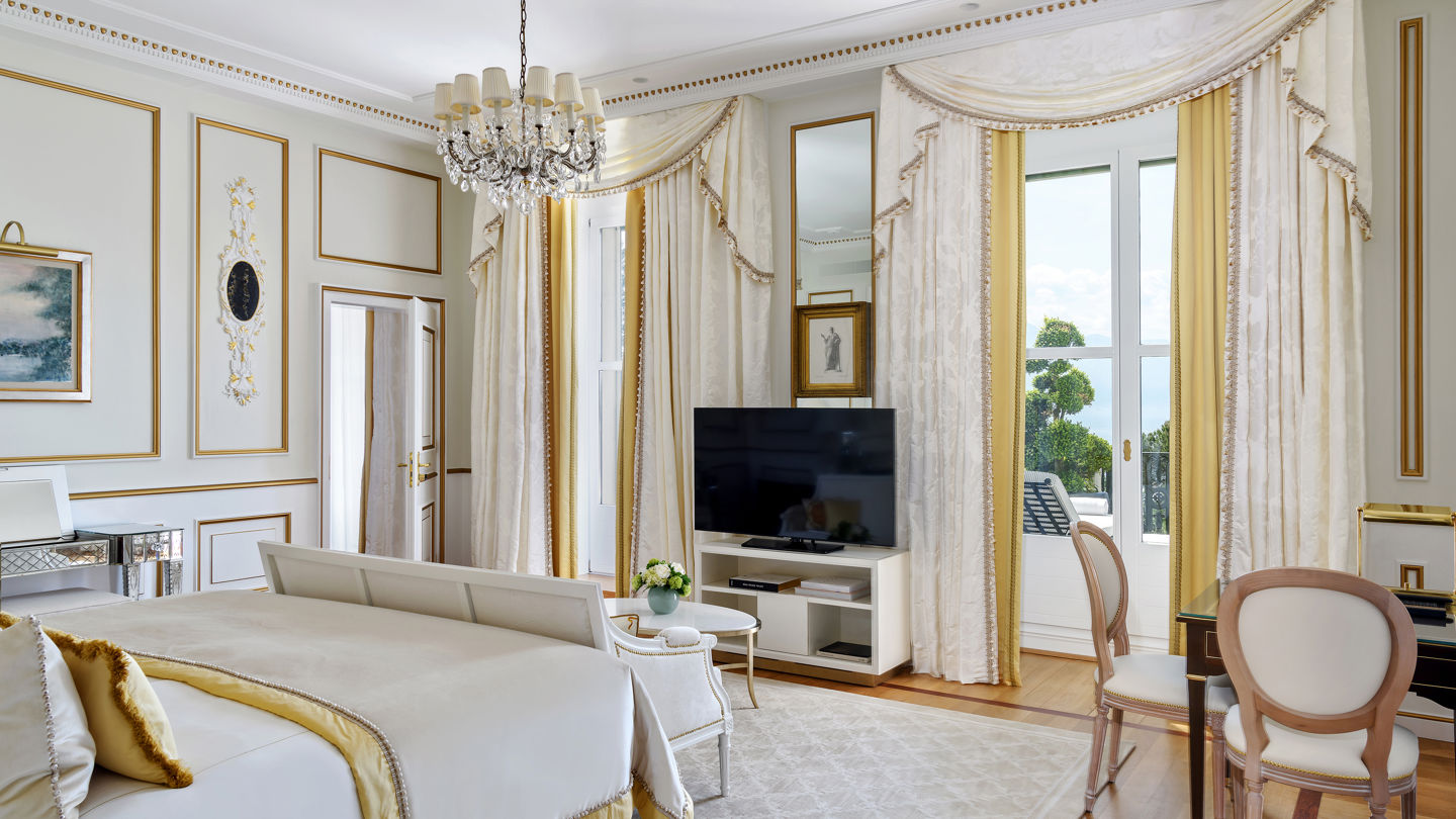 Master bedroom of the Imperial Suite at Beau-Rivage Palace in Lausanne overlooking the lake and the Alps