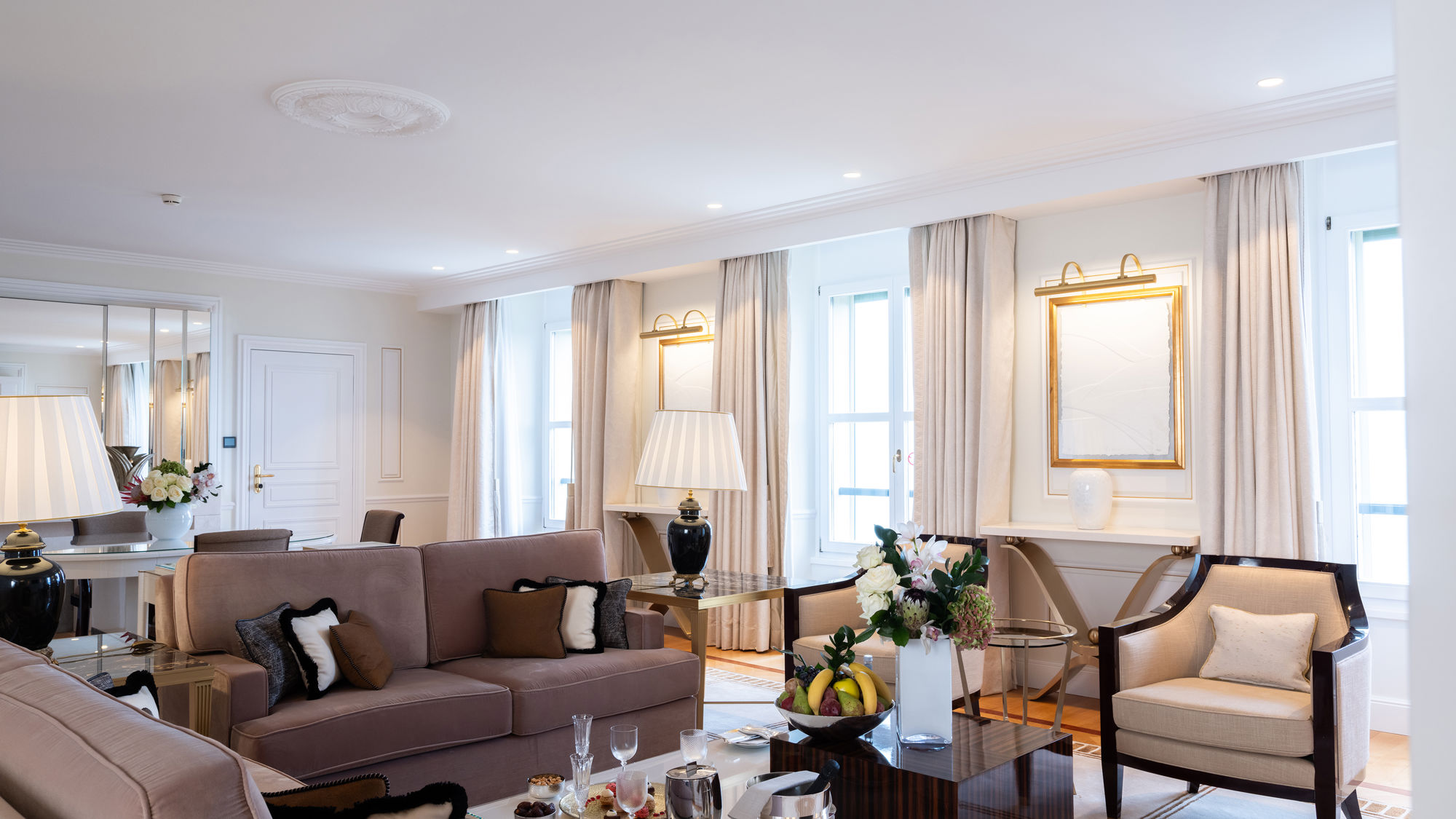 Living room of the Art Déco Suite at Beau-Rivage Palace in Lausanne overlooking the lake and the Alps