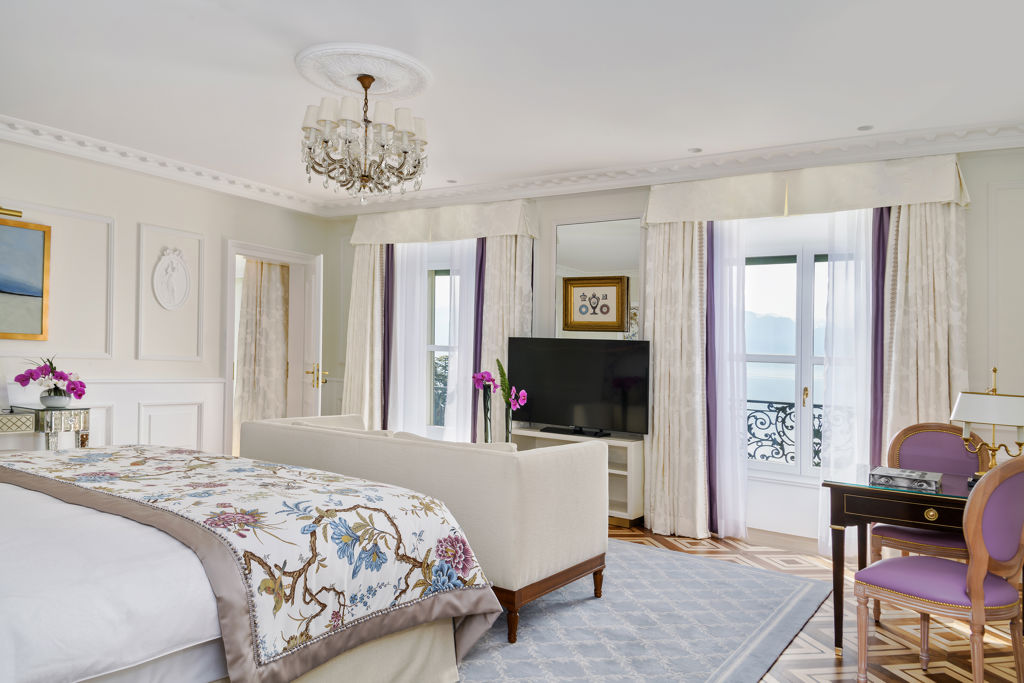 Master bedroom of the Malmaison Suite at Beau-Rivage Palace in Lausanne overlooking the lake and the Alps