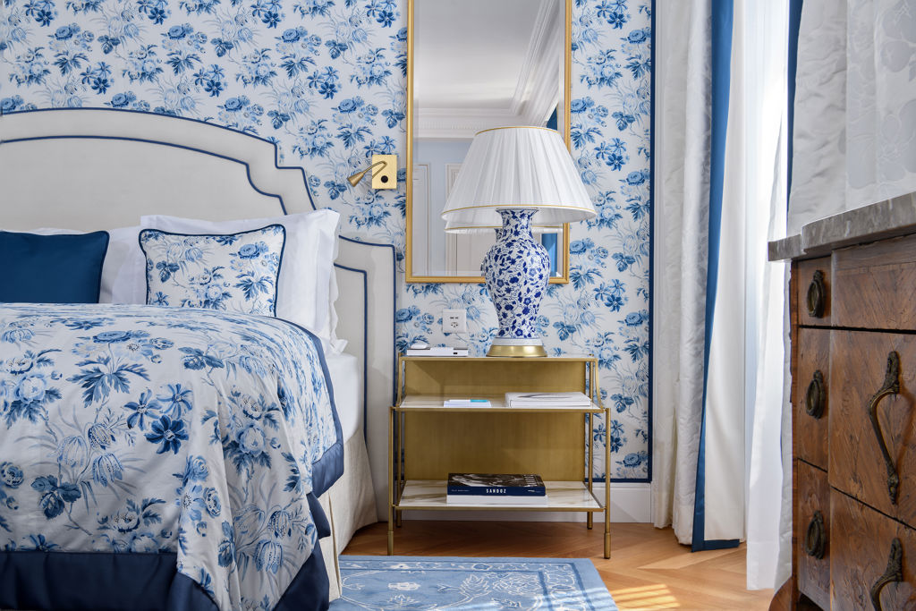 Details of the bedroom of the Deluxe Lake and Alps View Room at Beau-Rivage Palace in Lausanne