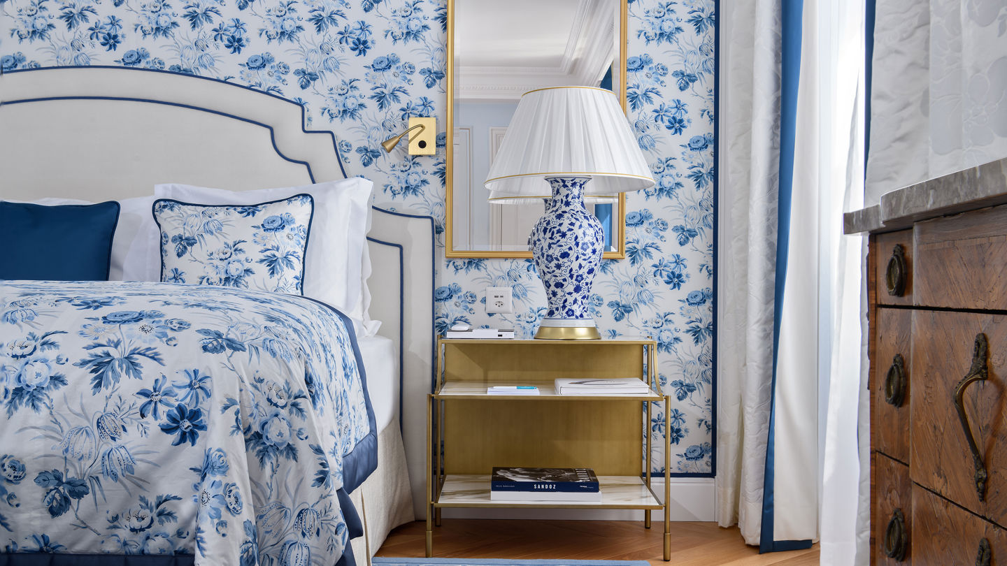 Details of the bedroom of the Deluxe Lake and Alps View Room at Beau-Rivage Palace in Lausanne