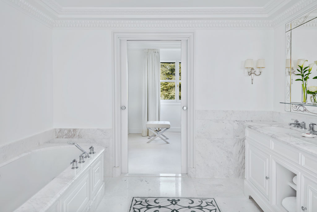 Luxury bathroom in the Panoramic Suite at Beau-Rivage Palace in Ouchy with views over the gardens