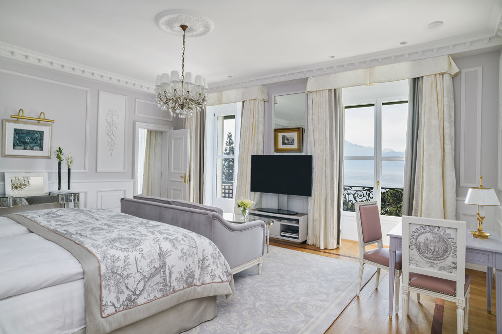 Master bedroom of the Royal Suite at Beau-Rivage Palace in Lausanne overlooking the lake and the Alps