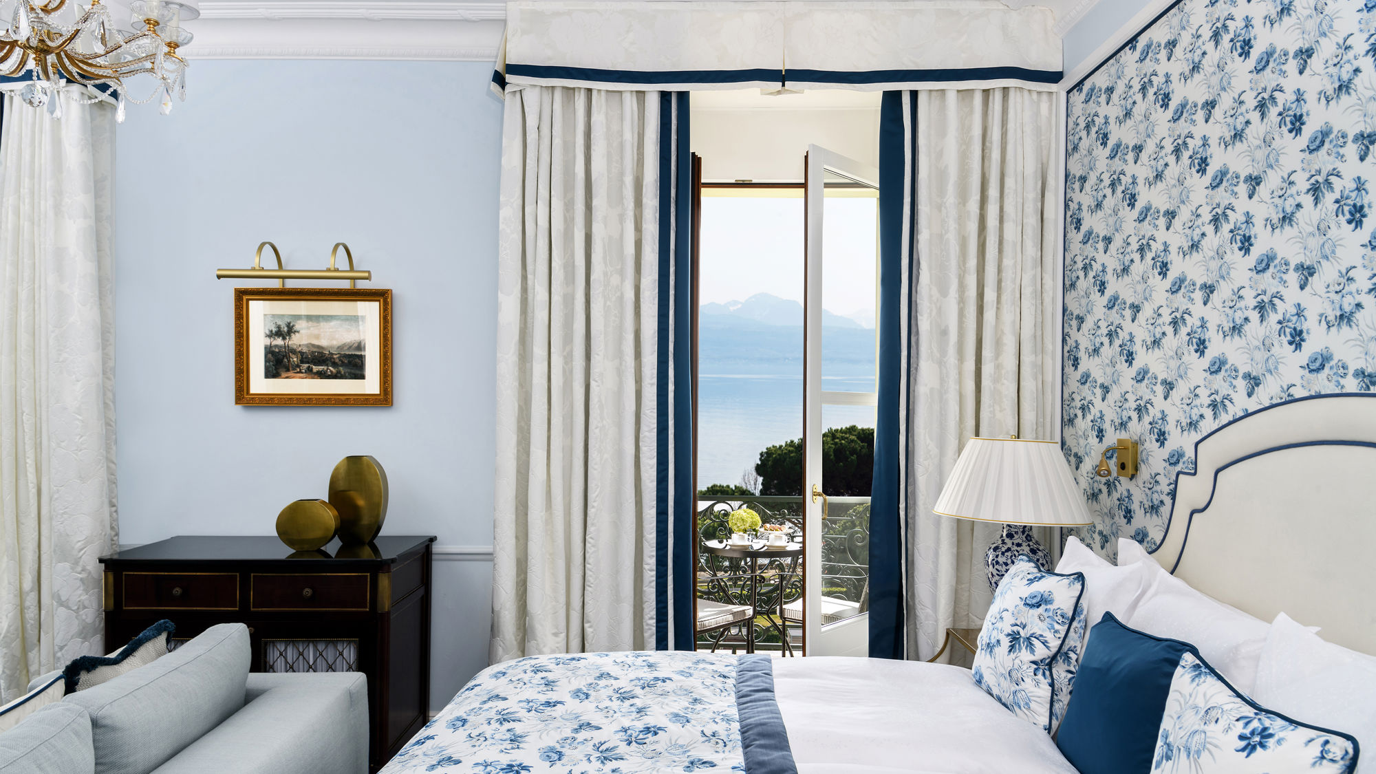 Details of the bedroom of the Deluxe Lake and Alps View Room at Beau-Rivage Palace in Lausanne overlooking the lake and the Alps