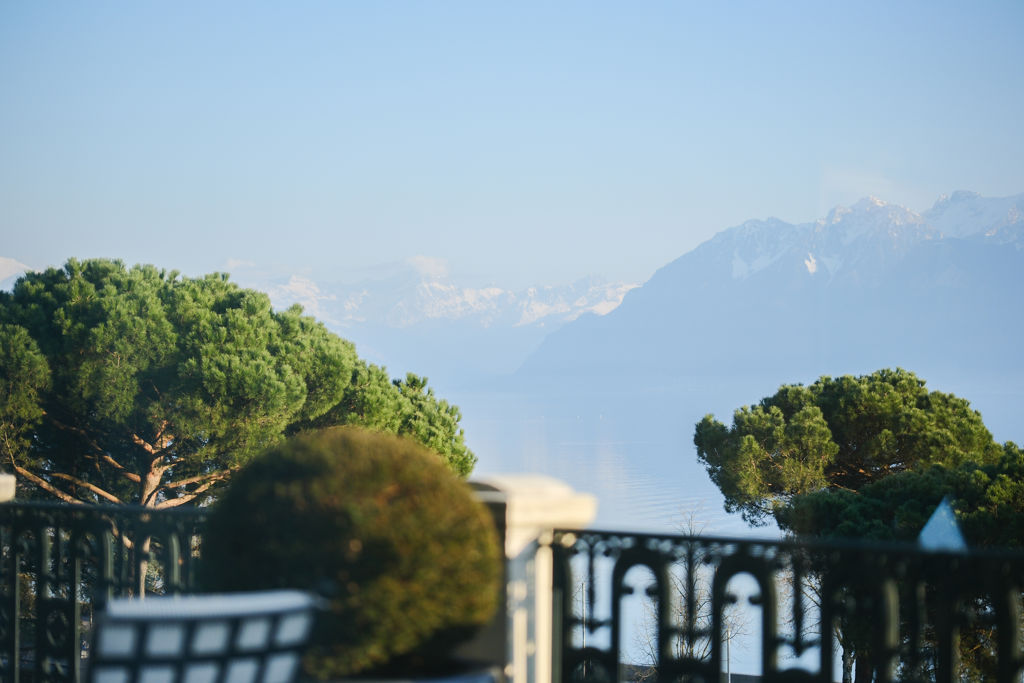 View over the lake and the Alps from the terrace of the Imperial Suite at Beau Rivage Palace in Lausanne