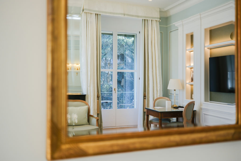 View of the 10 acres park through a mirror of the Riviera Suite at Beau-Rivage Palace in Lausanne